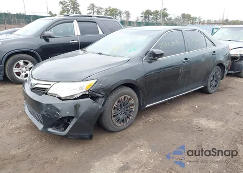 2014 Toyota Camry Le z USA, uszkodzony, nr VIN 4T4BF1FK2ER380577
